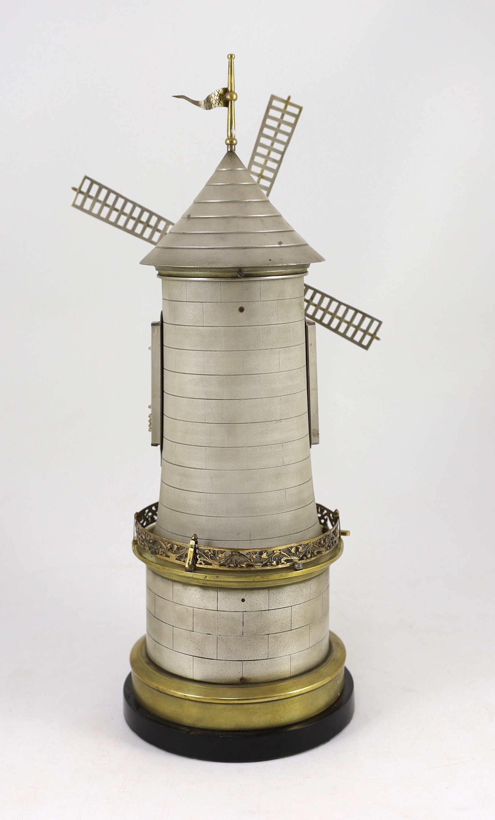 A 19th century French industrial windmill clock, by Guilmet Height 47cm.